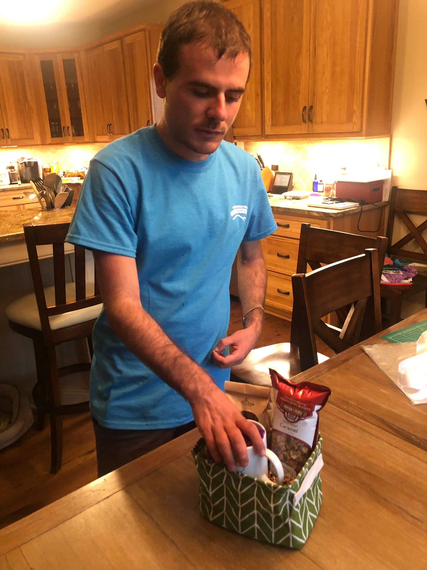 Basketeer Brett putting together a Just Because Gift Basket